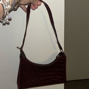 Crocodile texture, red wine bag